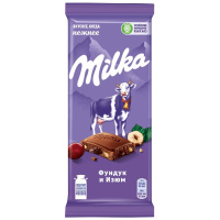 Шоколад Milka молочный фундук и изюм, 85г