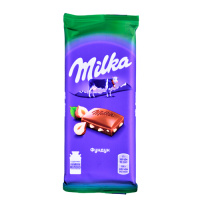 Шоколад Milka молочный с дробленым фундуком, 85г